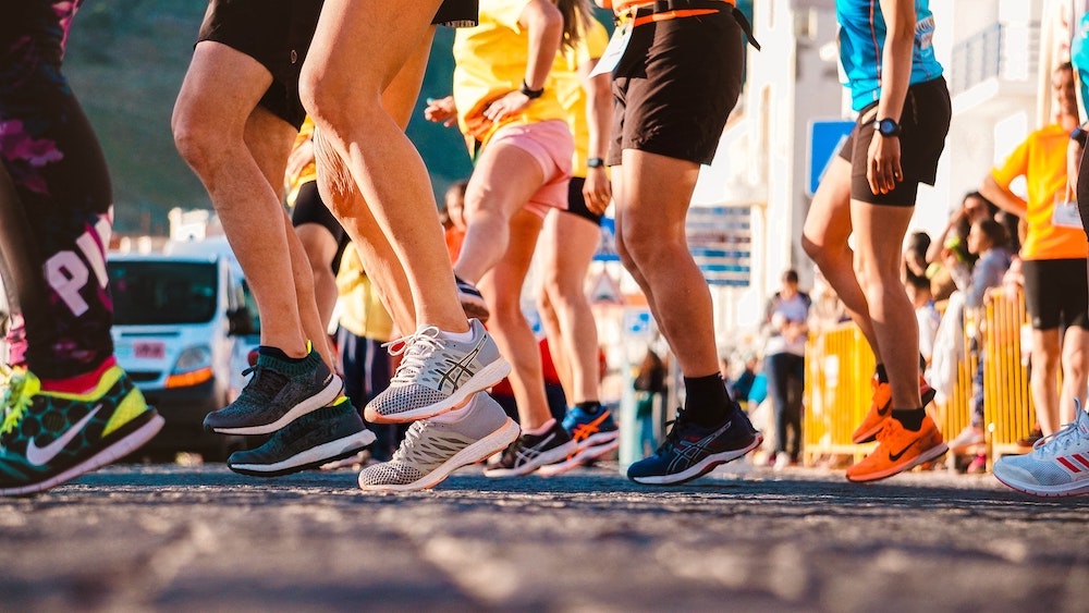 Where to Get Running Shoes for the Cedar Rapids Marathon | Runners getting ready for a race
