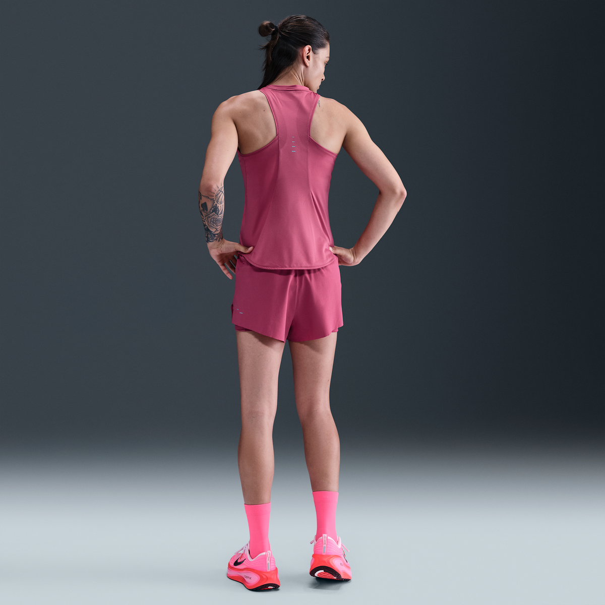 Nike Women's Dri-FIT Running Tank Top 634 Sweet Beet/reflective Silv pair angle