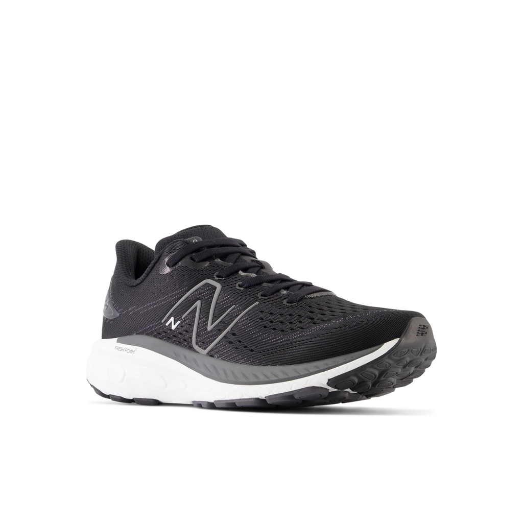 New Balance Kids' 860 v13 K Black/white pair angle