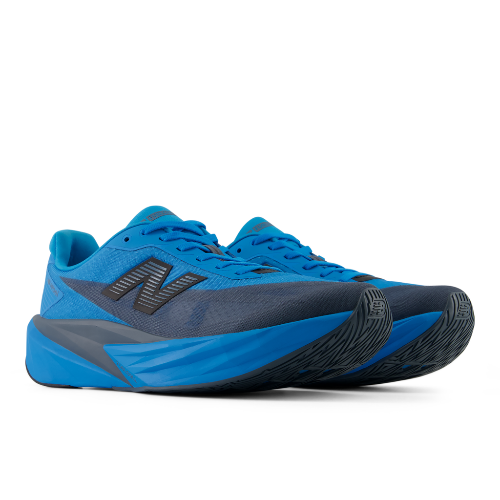 New Balance Men's Fuelcell Rebel v5 9SG Altitude/Shadowblue pair angle