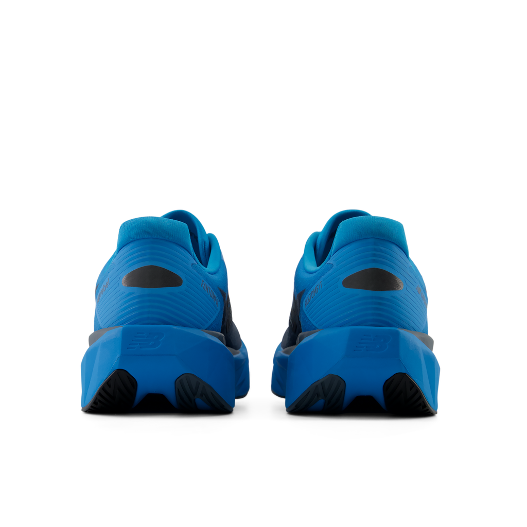 New Balance Men's Fuelcell Rebel v5 9SG Altitude/Shadowblue heel